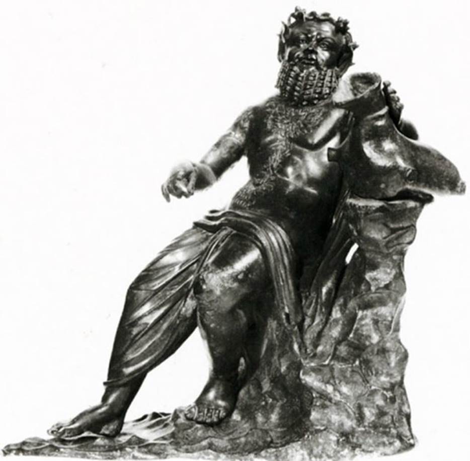 Villa dei Papiri, Herculaneum. Atrium. Bronze statue of Silenus with a wineskin and right hand raised found in 1754 round the impluvium.
Now in Naples Archaeological Museum. Inventory number 5007.